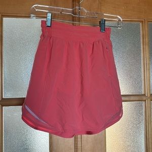 Lululemon skort- pink!  Shorts underneath with pockets!  Size 0